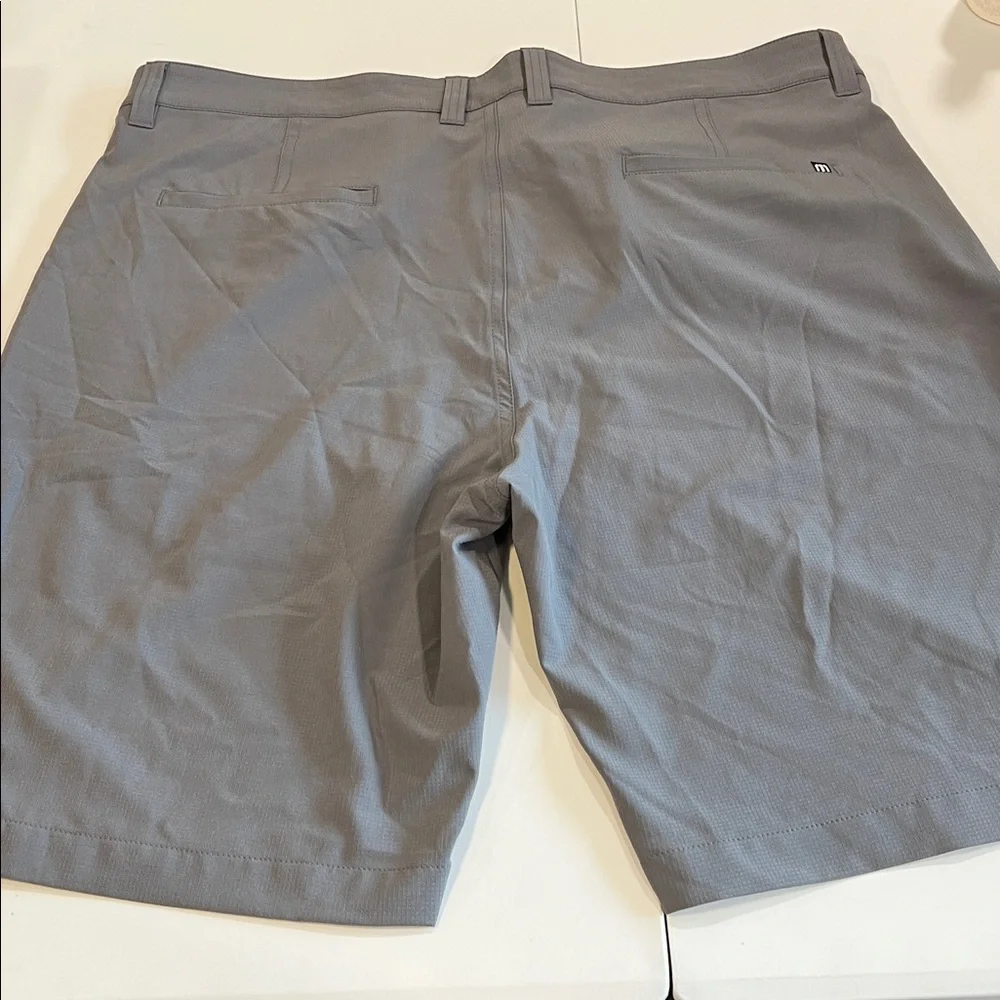 Travis Mathew - 38, light weight gray flat front‎ shorts